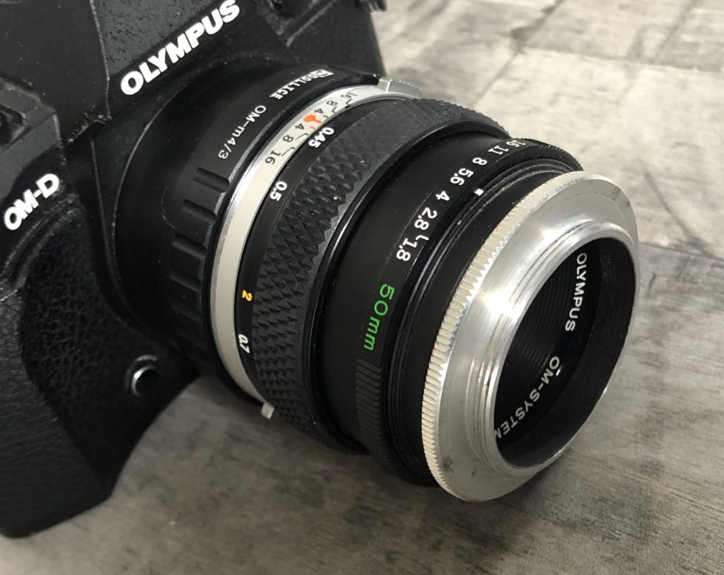 Olympus lens with reversing ring